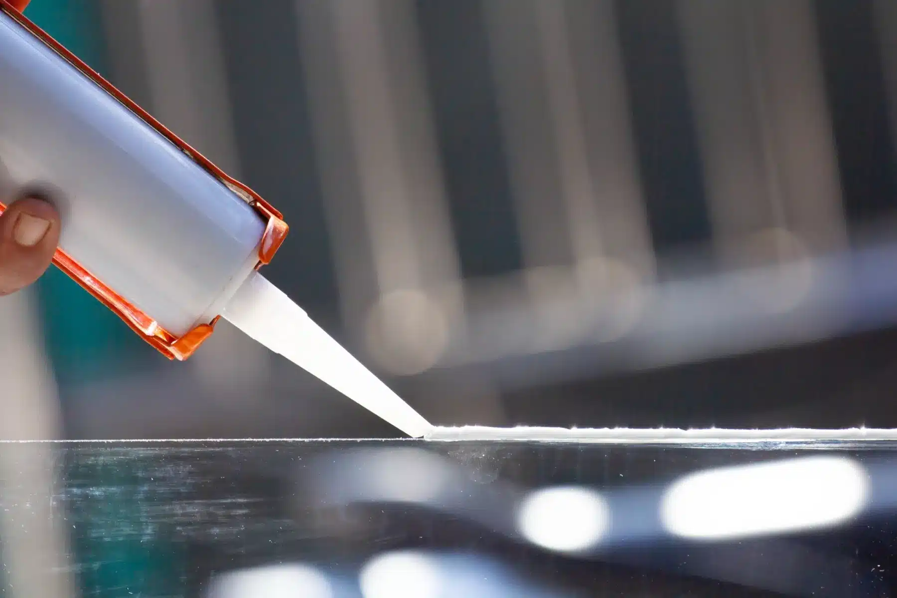 Industrial sealant being applied from a cartridge